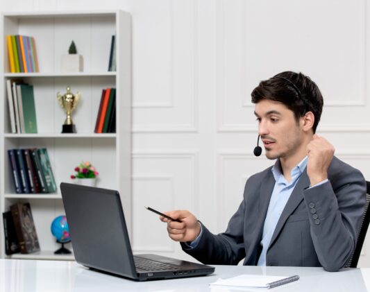 customer-service-cute-guy-grey-suit-with-computer-headset-holding-fists-up (1) customer-service-cute-guy-grey-suit-with-computer-headset-holding-fists-up (1)