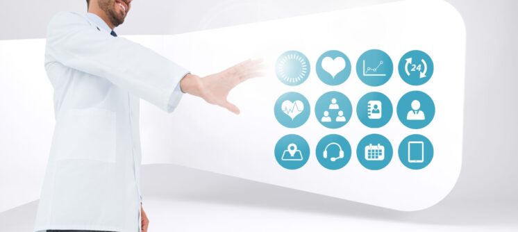 Digital composition of doctor touching digitally generated medical icons against white background