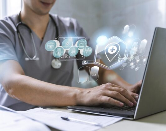 medical-banner-with-doctor-working-laptop