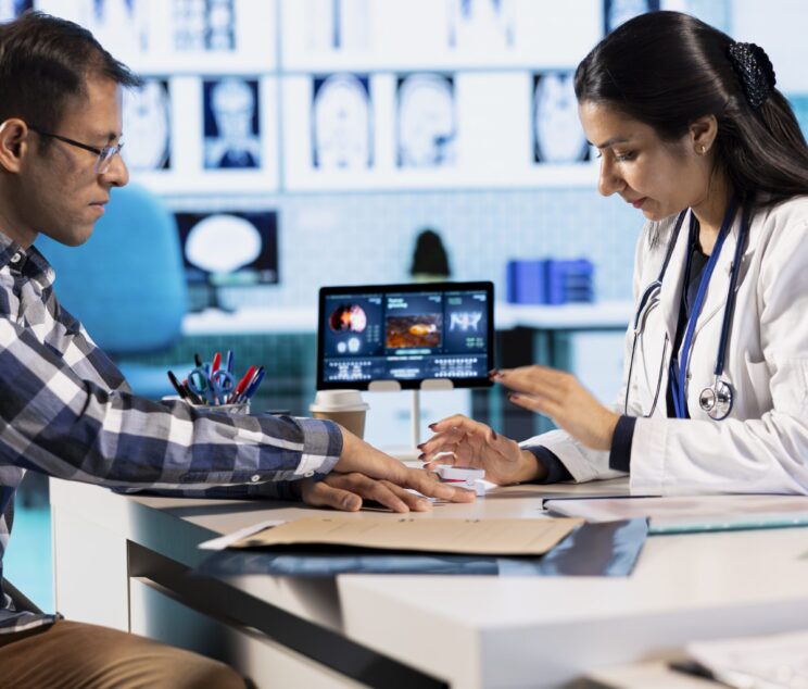 Healthcare professional uses an oximeter to measure the oxygen levels for a patient at check up, diagnostic tools for accurate medical advice. Monitoring pulse and saturation with indicator.